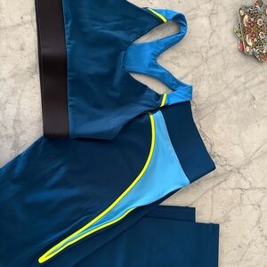 Stylish Blue and Black Leggings with Yellow Highlights